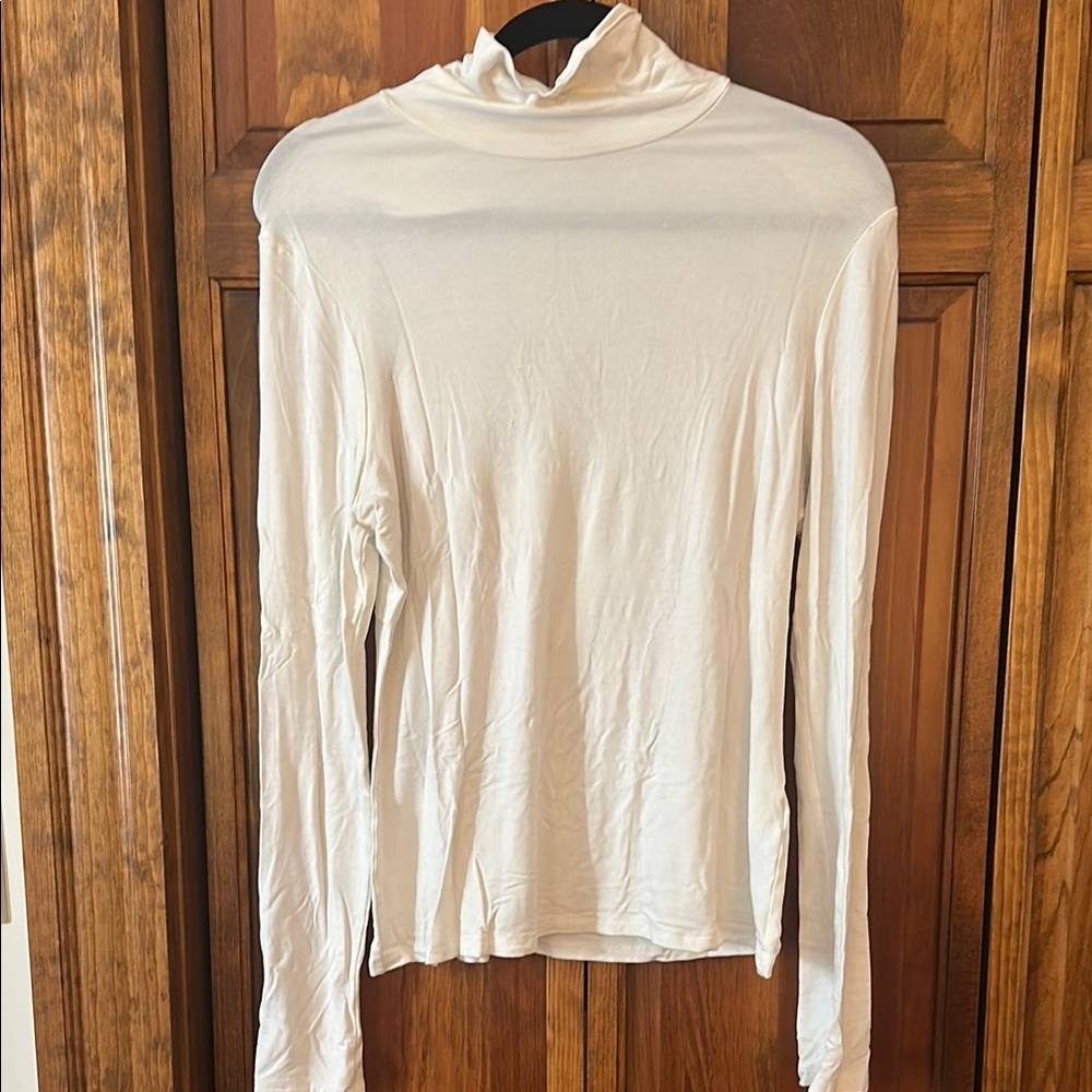 Elegant Three Turtleneck Tops